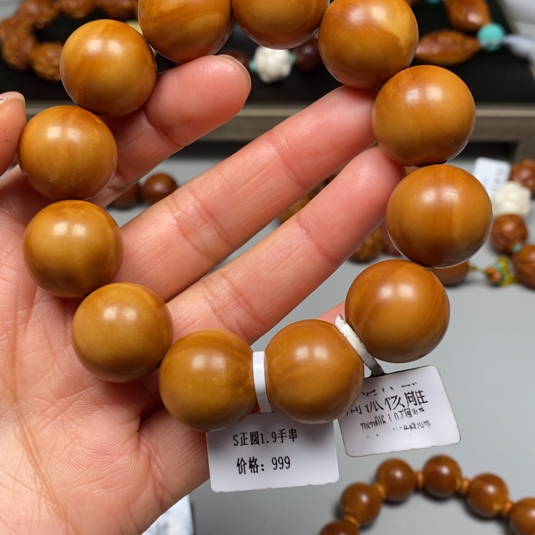 橄榄核吊坠正圆手串