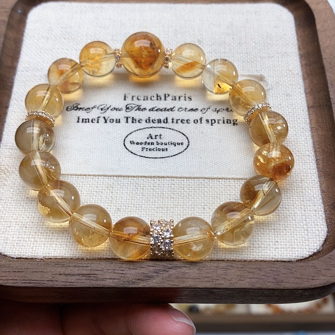 水晶手链未镶嵌V****。黄塔晶手串