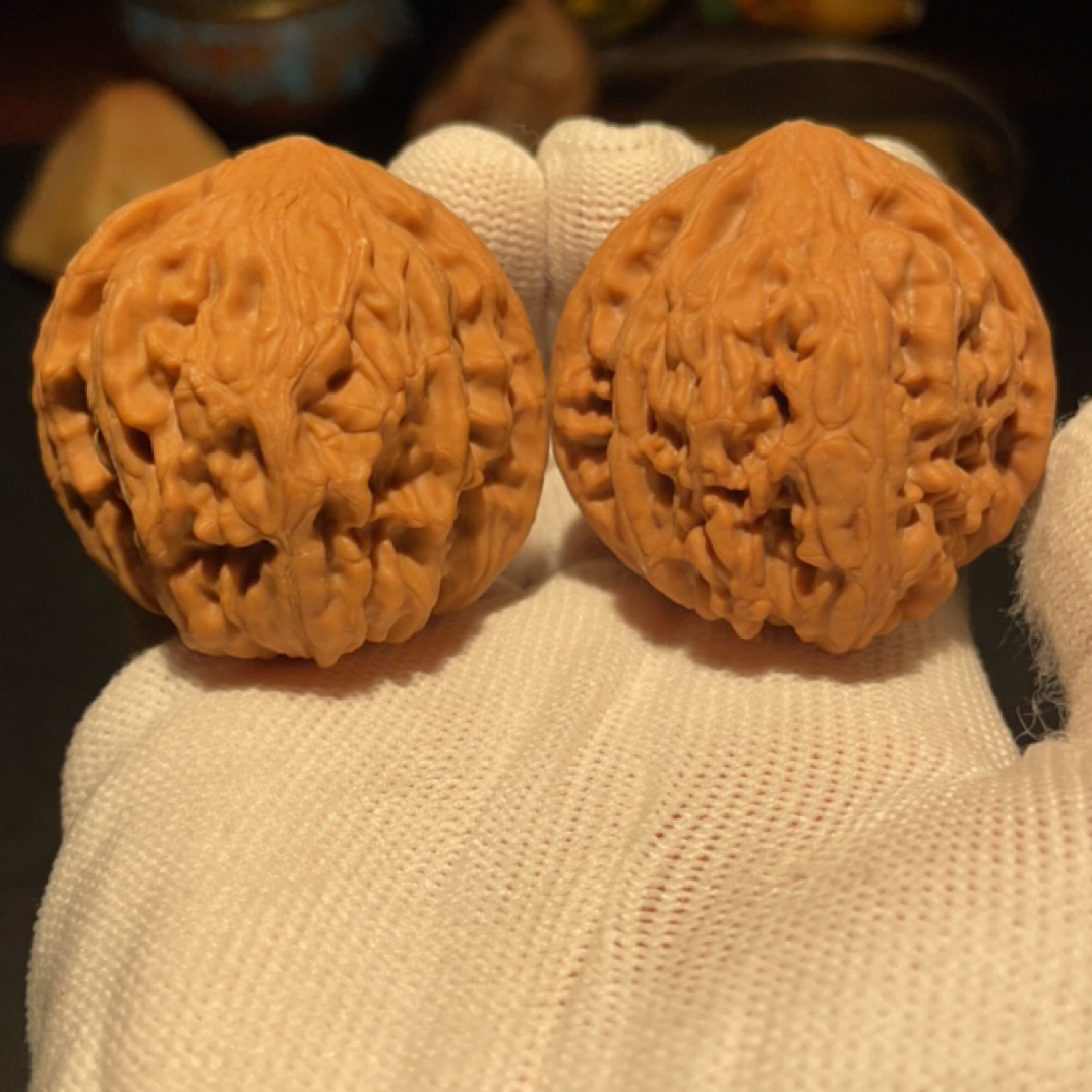 文玩核桃鸡心手把件
