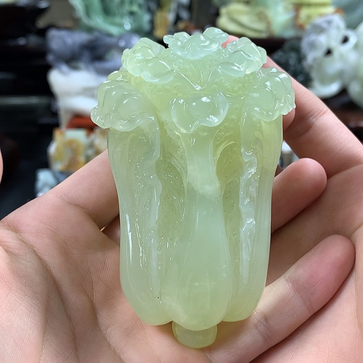 蛇纹石玉手把件合金