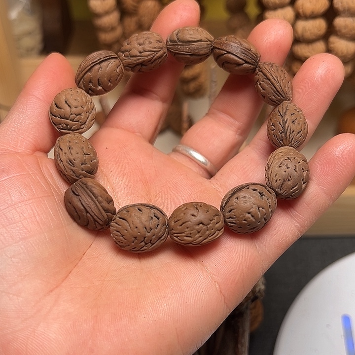 牟***桃核吊坠正宗桃枭手串