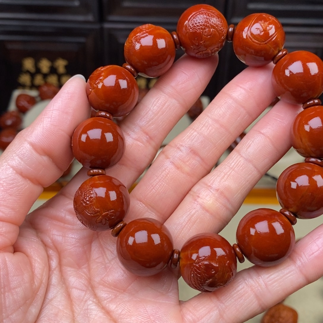 三***行橄榄核吊坠连年有余