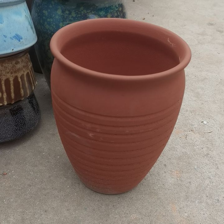 红陶口20高27瑕疵底部烧裂