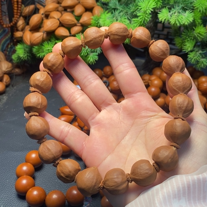 橄榄核手串1.7*1.9蜜桃臀