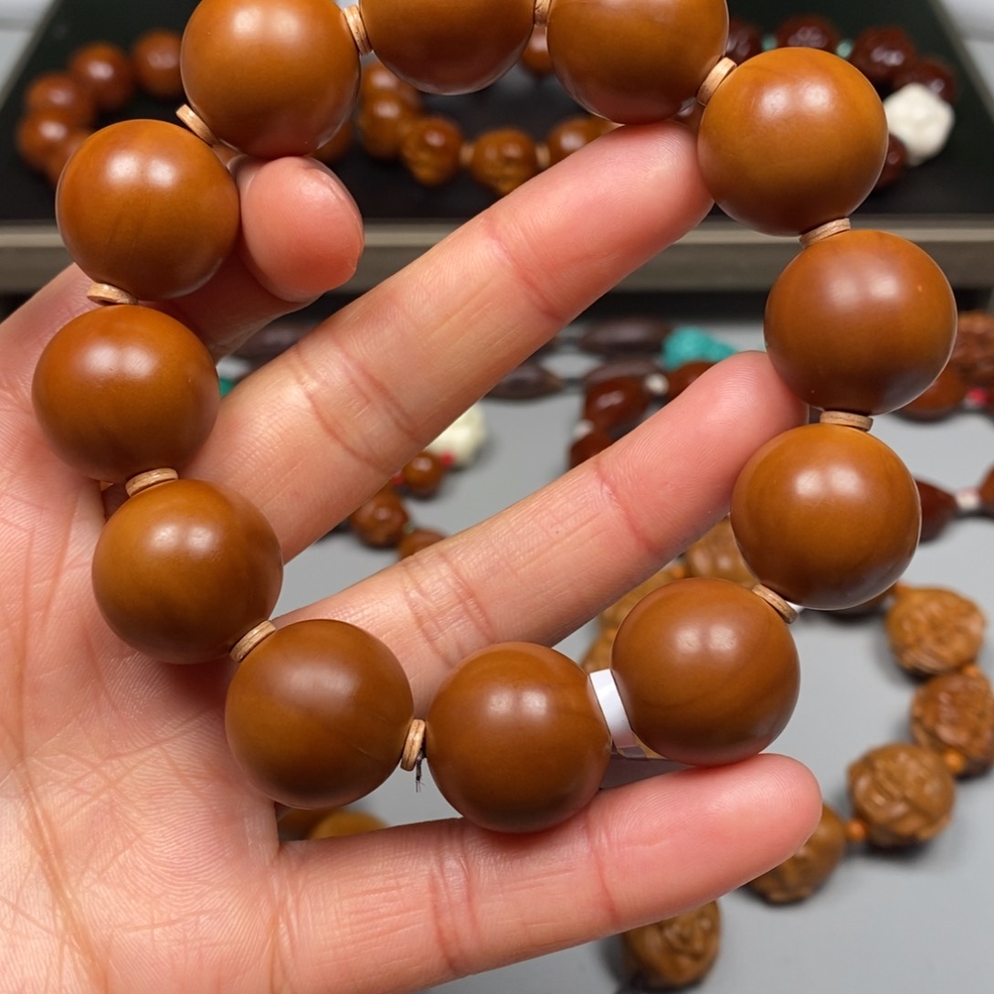 橄榄核吊坠正圆手串