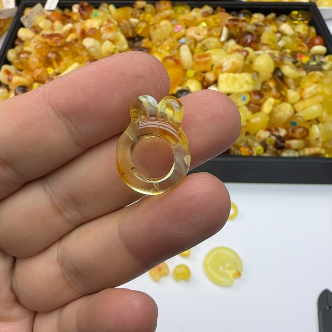 沐***琥珀未镶嵌裸石内径9.9有瑕