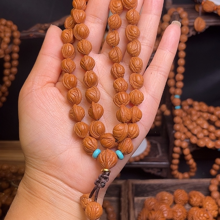 阿***贸手串桃核小龙纹手持