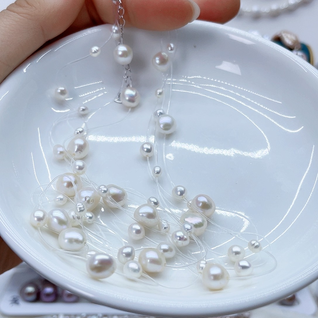 颈饰银S925镶嵌淡水珍珠悦****?