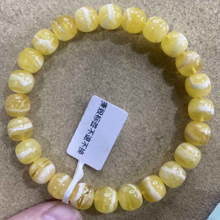 琥珀蜜蜡9mm橘底金瓷白溶洞腰花