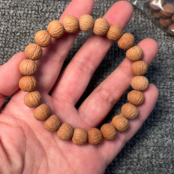 凤羽麒麟小馒头料雕刻精致精修小凤羽手串11MM二等