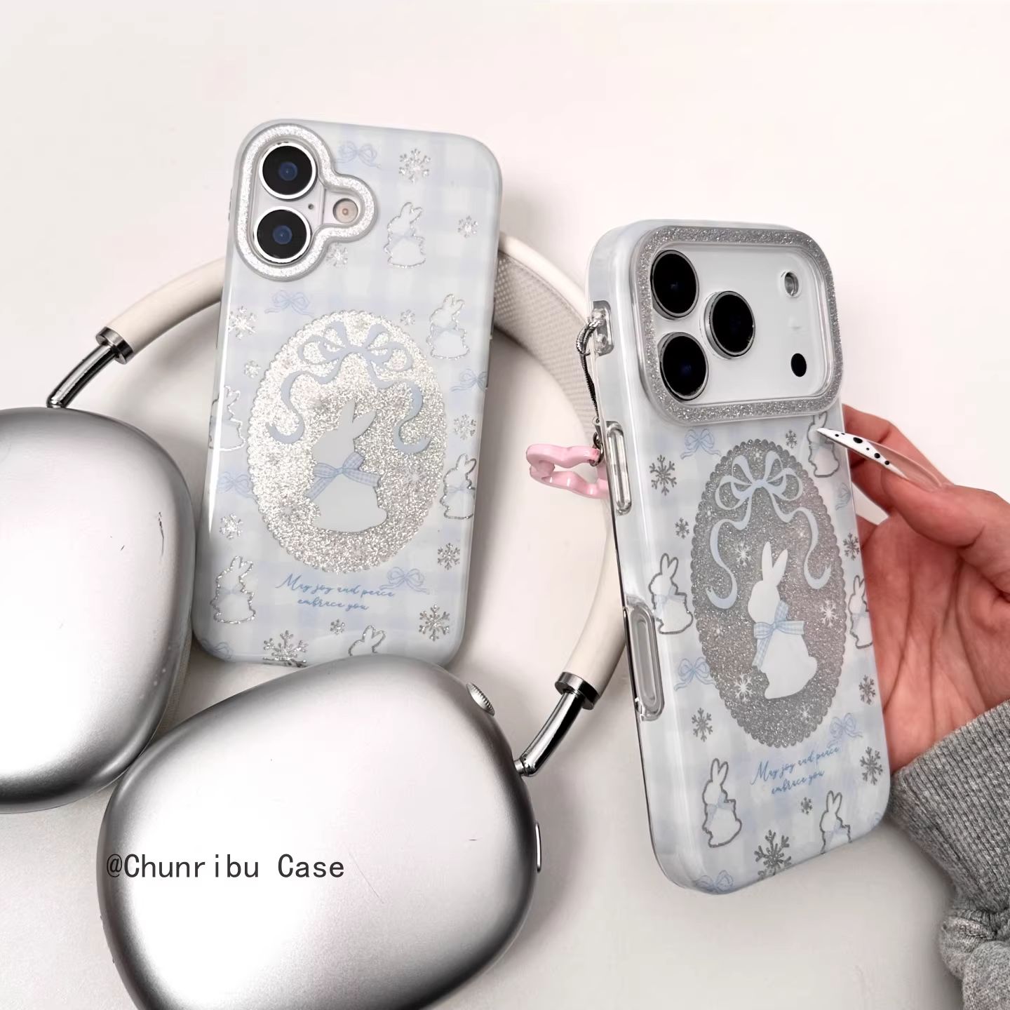 卡通闪闪镜头镂空蓝色蝴蝶结兔子适用苹果17/16promax手机壳15/14