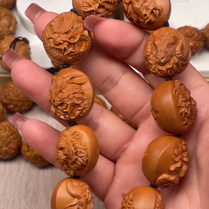 释***然橄榄核吊坠橄榄核