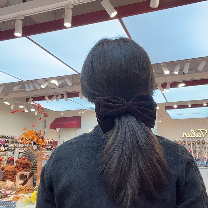 布艺铁合金咖色香蕉夹