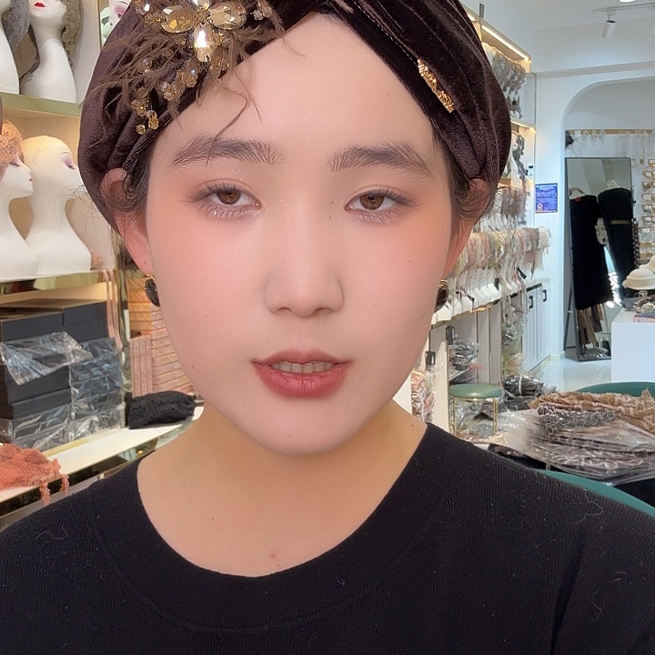 纯棉金丝绒咖色羽毛发带帽