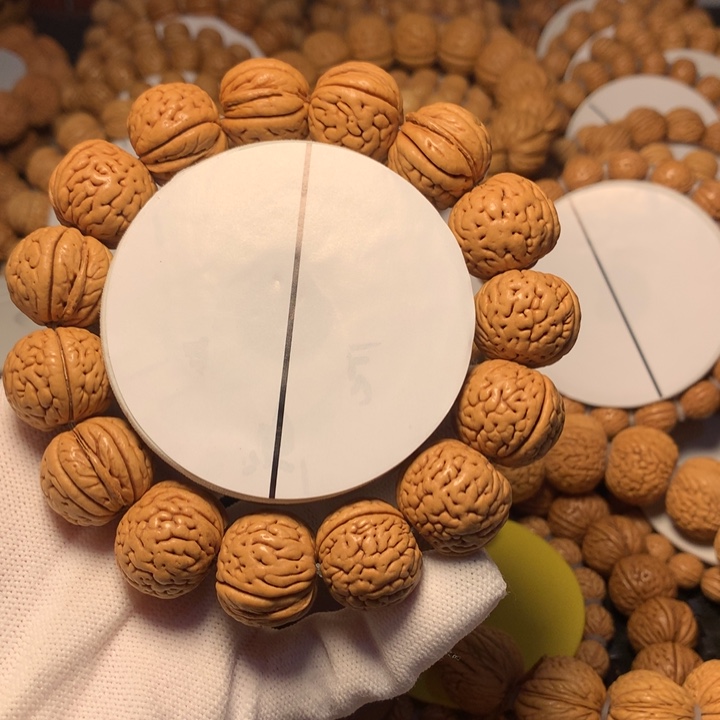 桃核手串风**向1号链接。。。。