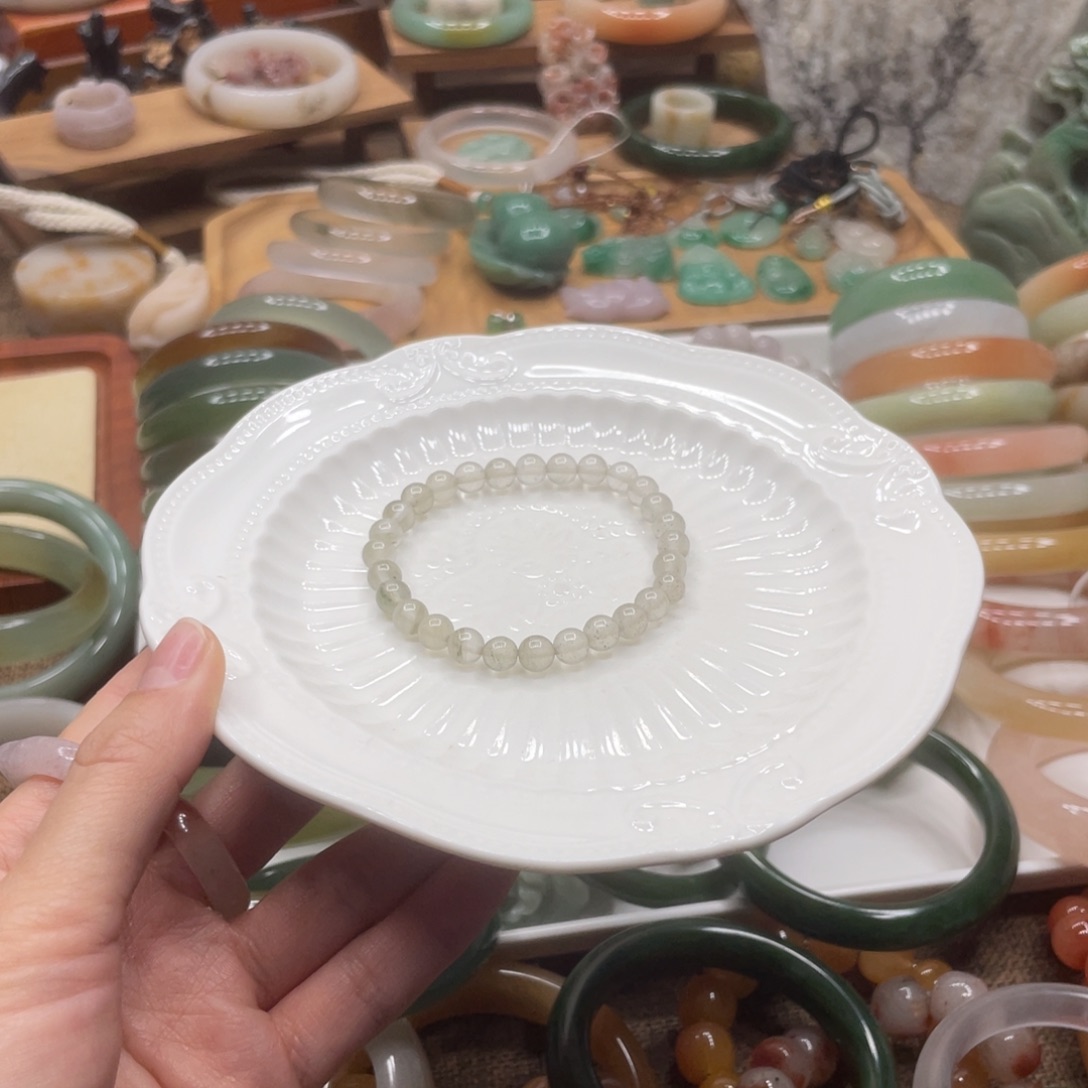 阿***呆石英岩玉未镶嵌手链