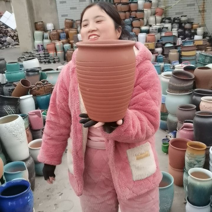 红陶口20高27瑕疵底部烧裂