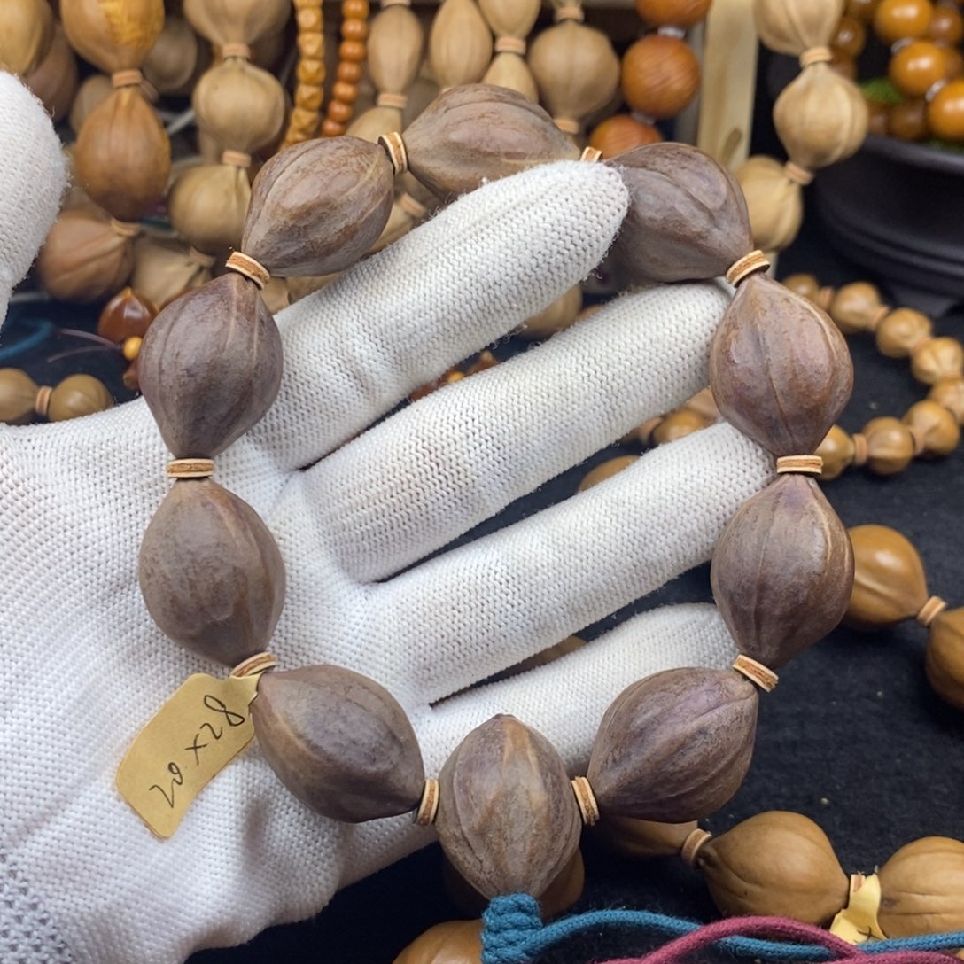 橄榄核手串/手链2028三花紫皮10颗