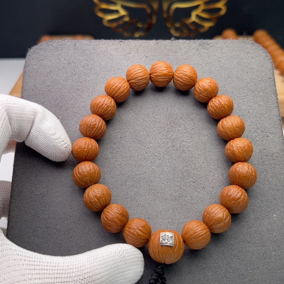 就***吧猴头核桃吊坠精品旗舰凤羽