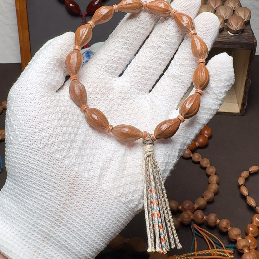 阿***！橄榄核吊坠哈哈哈哈哈哈哈哈