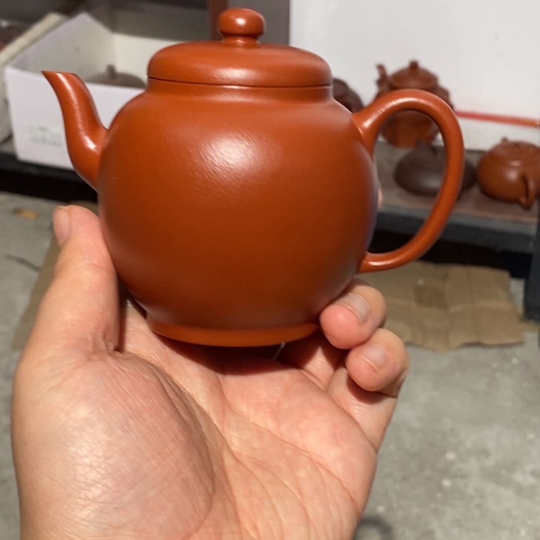 紫砂公道杯紫砂壶。紫砂壶