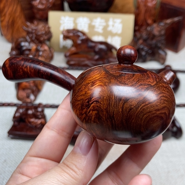 花梨木类案台唐羽壶