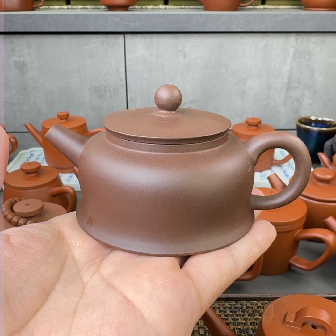 紫砂茶壶微瑕半手曲钟