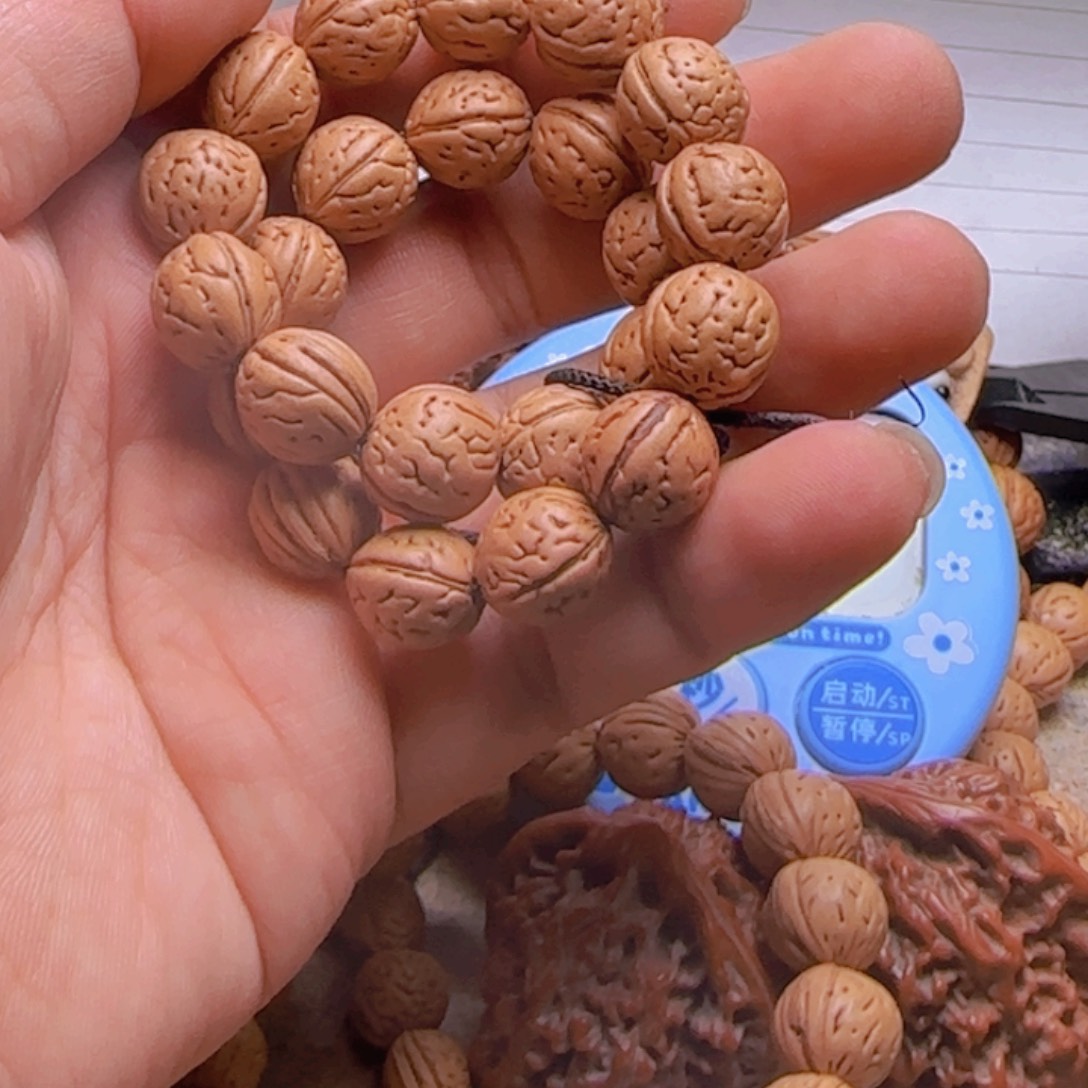 天****拍135野生桃核宽旗三道筋手持