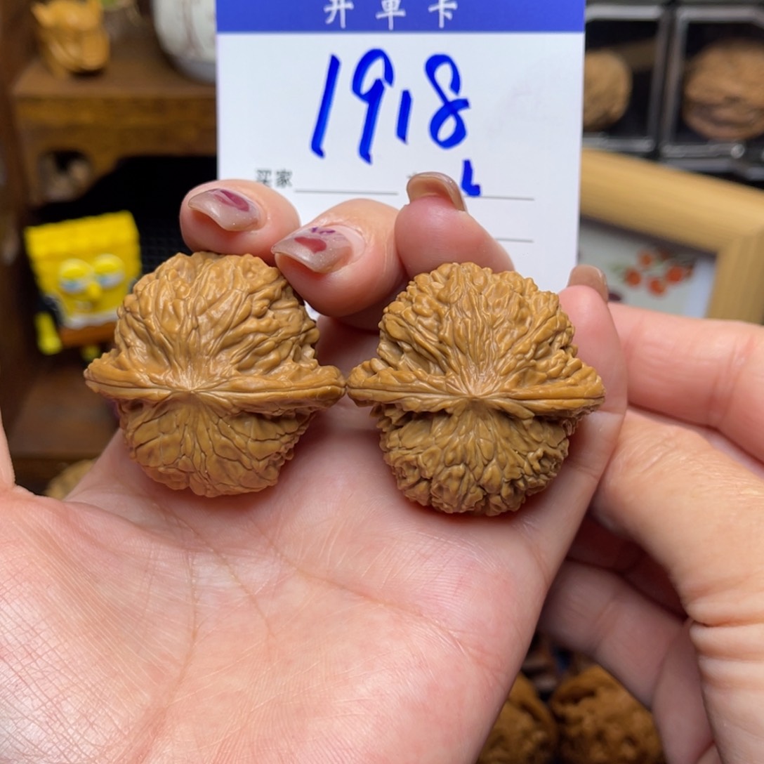 桃核把件磨盘39李。   