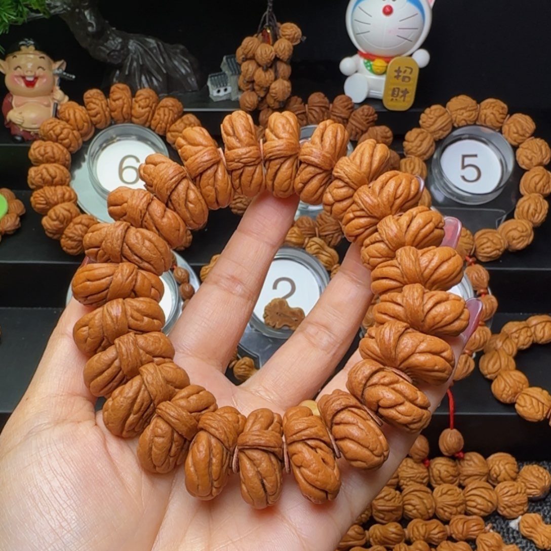 不***心吊坠桃核霸王龙手串