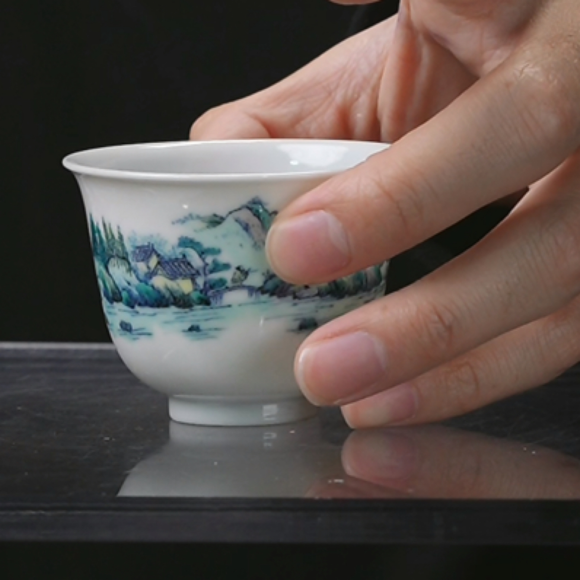 X斗彩山水通景纹杯