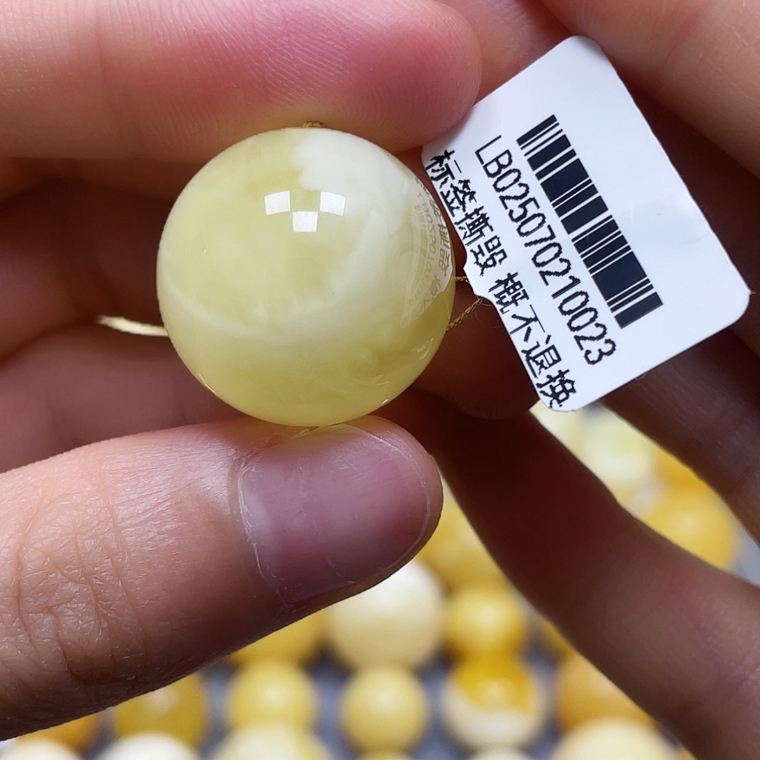 蜜蜡未镶嵌裸石21.2mm.瑕