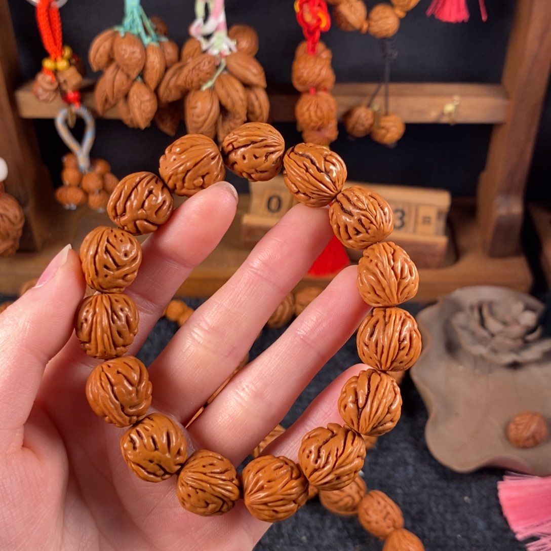吊坠桃核桃枭手串