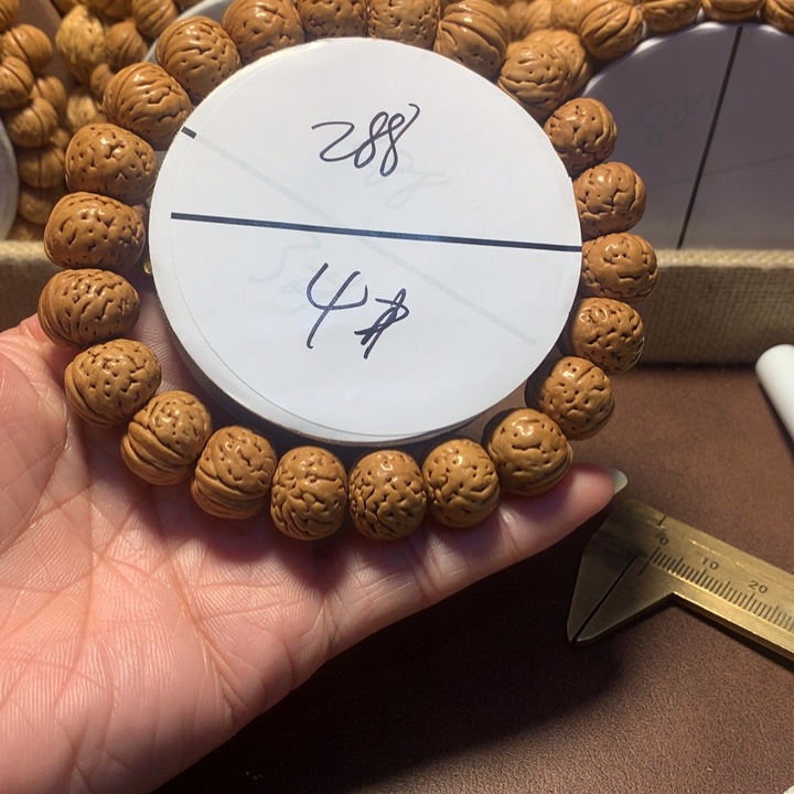 十***.手串桃核4#纽扣桃核