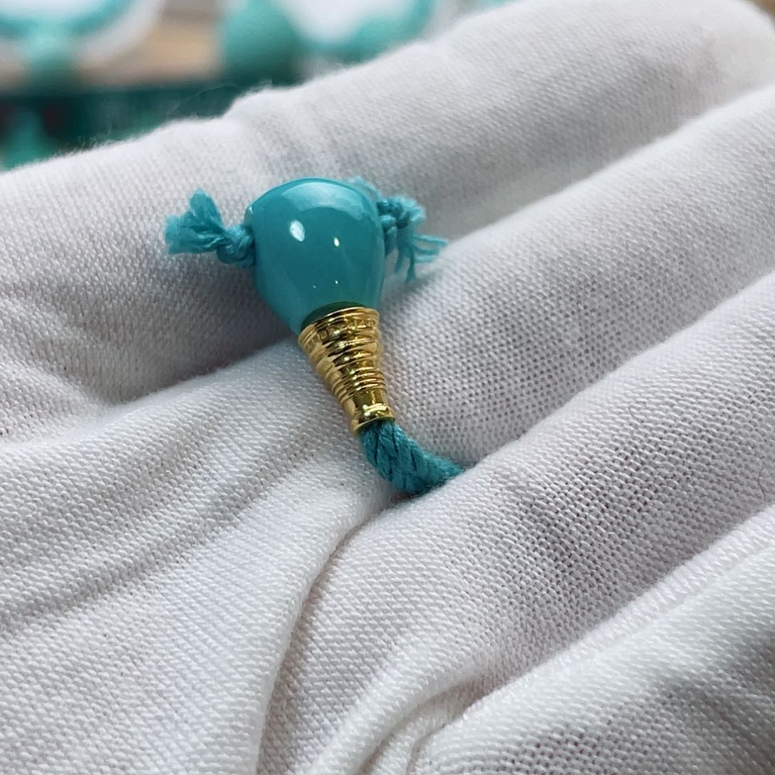 绿松石珠宝奇石18K金镶嵌毛***人