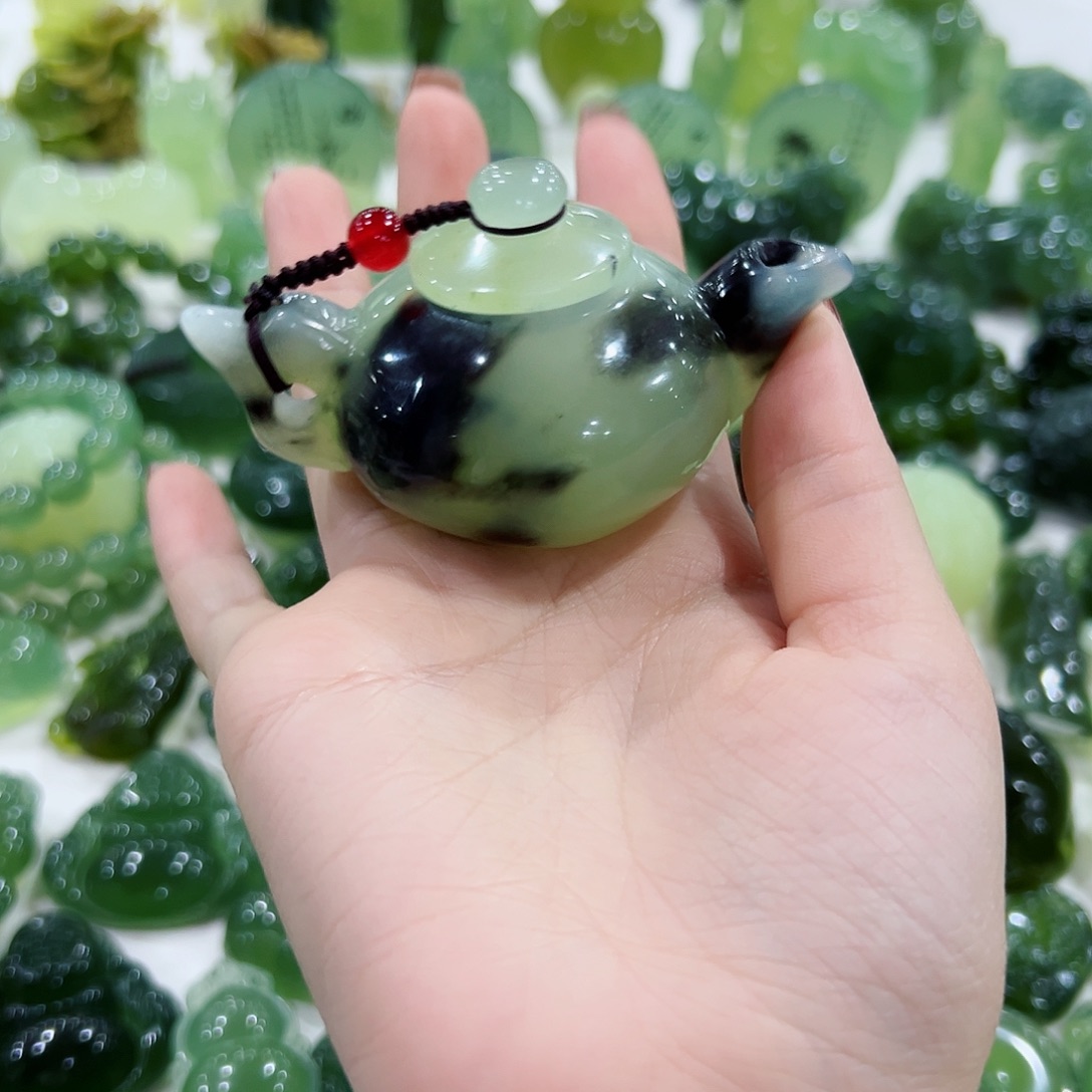 穆***馆蛇纹石玉未镶嵌手把