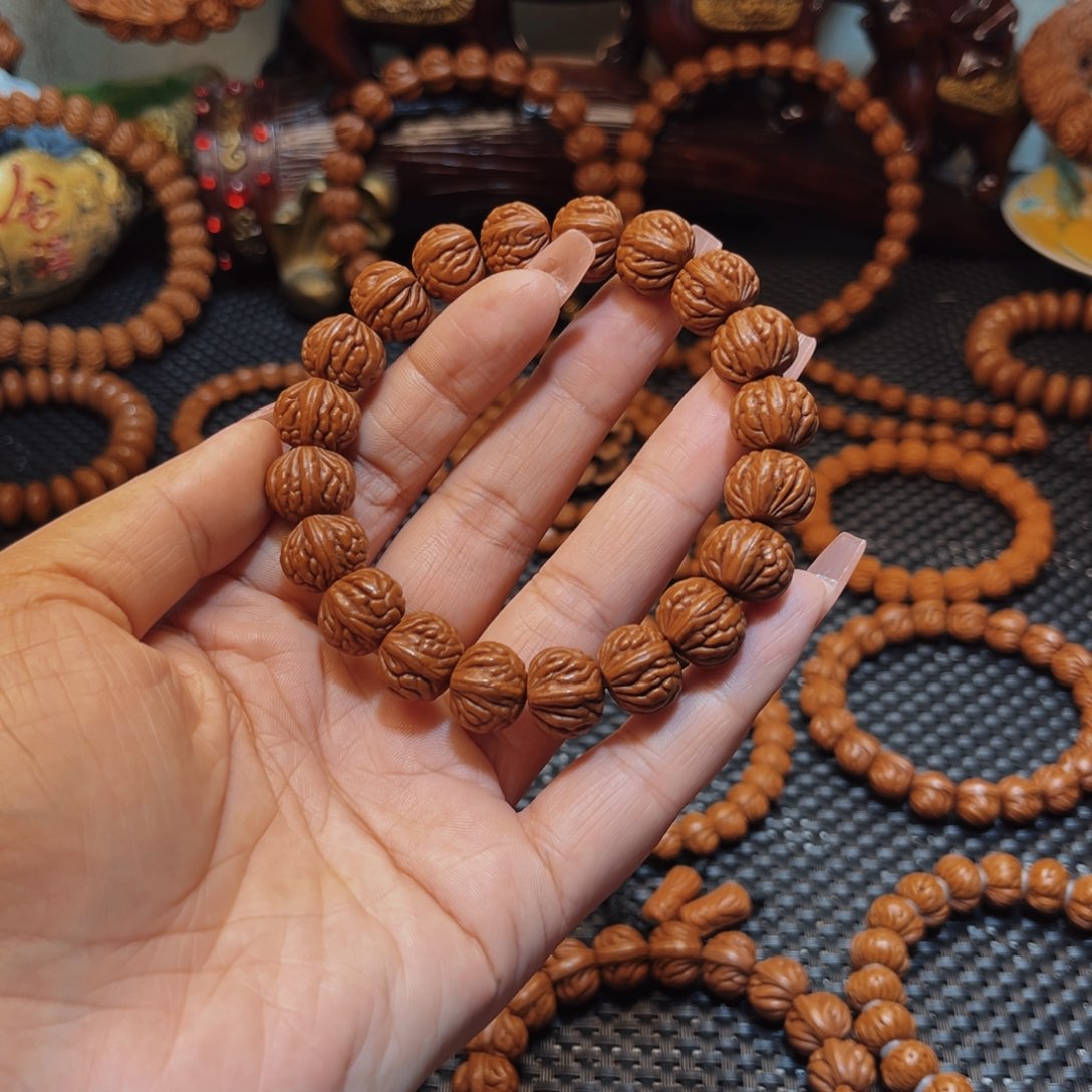 濬***)桃核手串14顶级双脊龙单圈