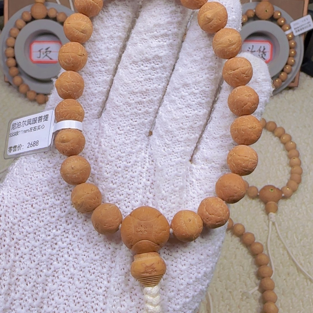 陈***炀手串凤眼菩提11mm左右手串实心