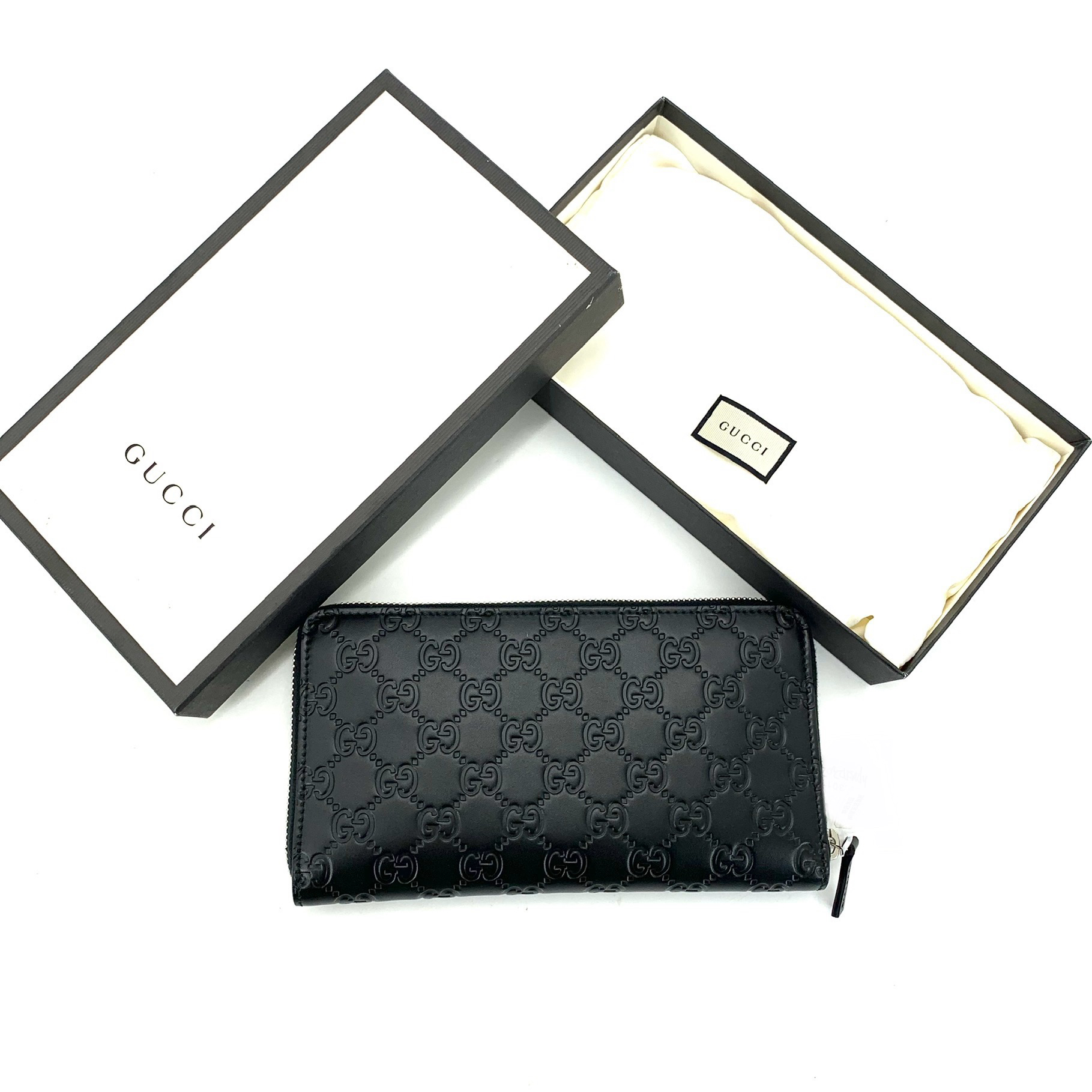 99新 GUCCI/古驰 黑色全皮压花拉链钱包 尺寸21/12男士压纹皮钱包