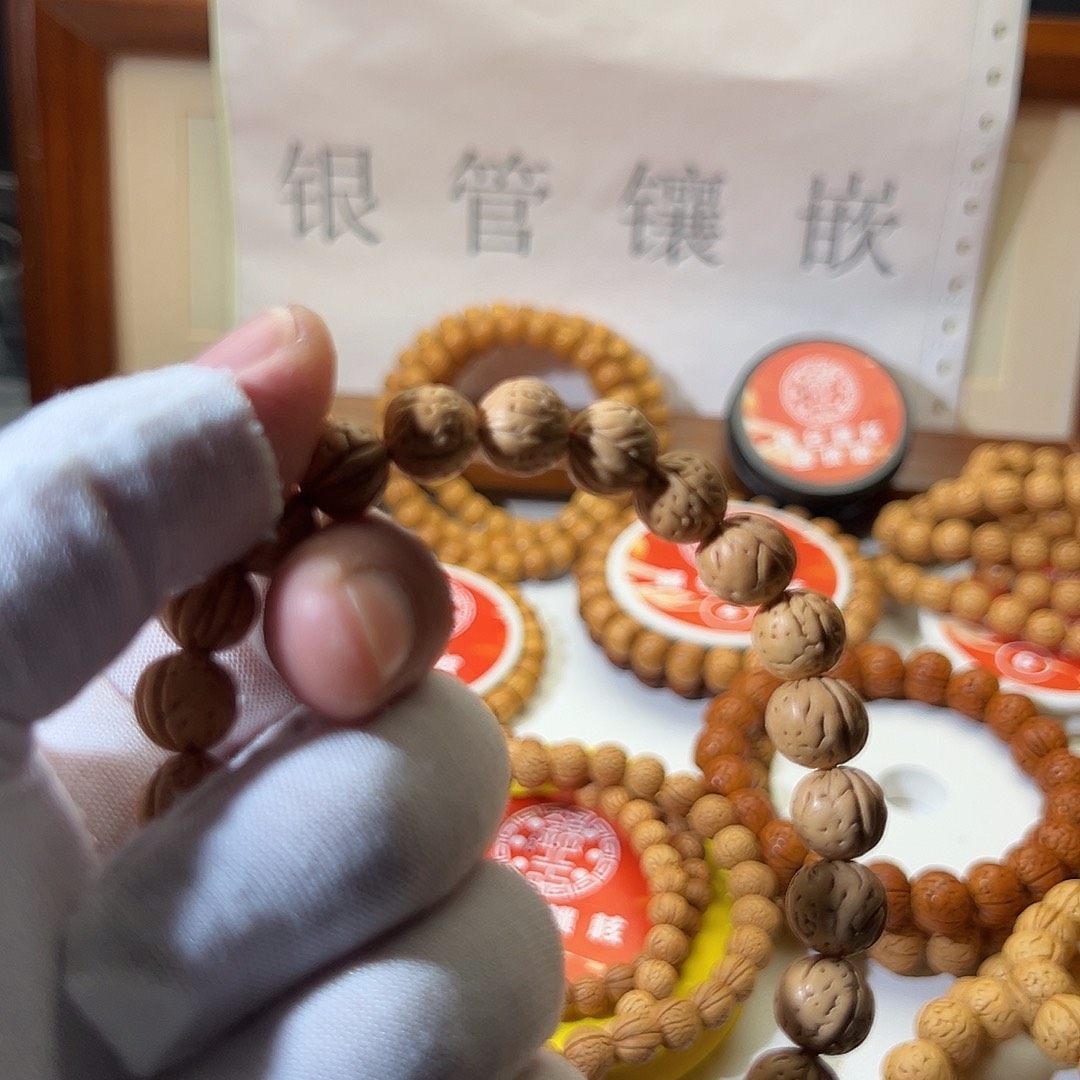 L***U手串桃核奶油宽脐