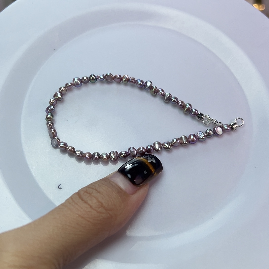 喃***南钛钢淡水珍珠手绳