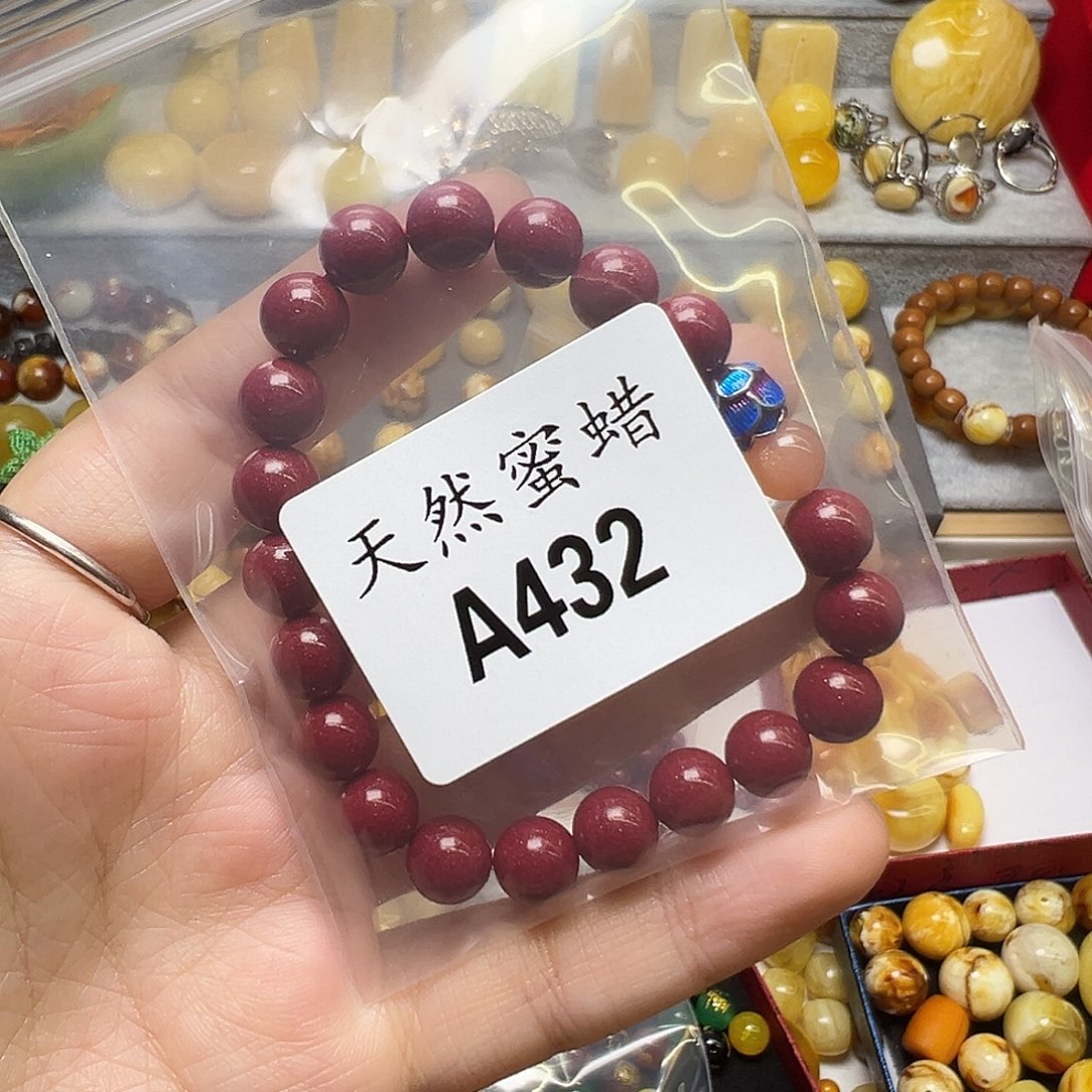 孟***。蜜蜡未镶嵌裸石432号，8mm