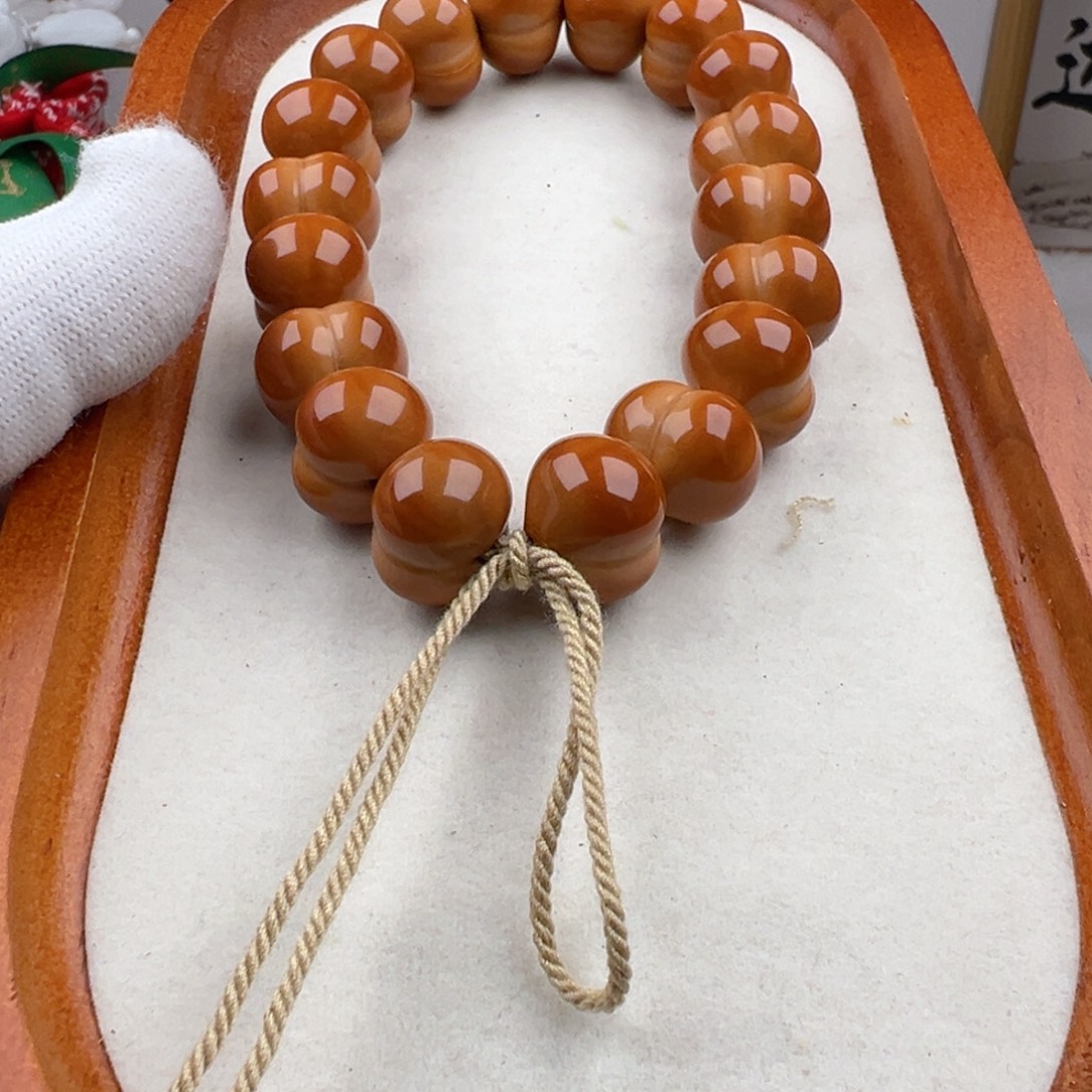 人***。手串猴头核桃大屁桃