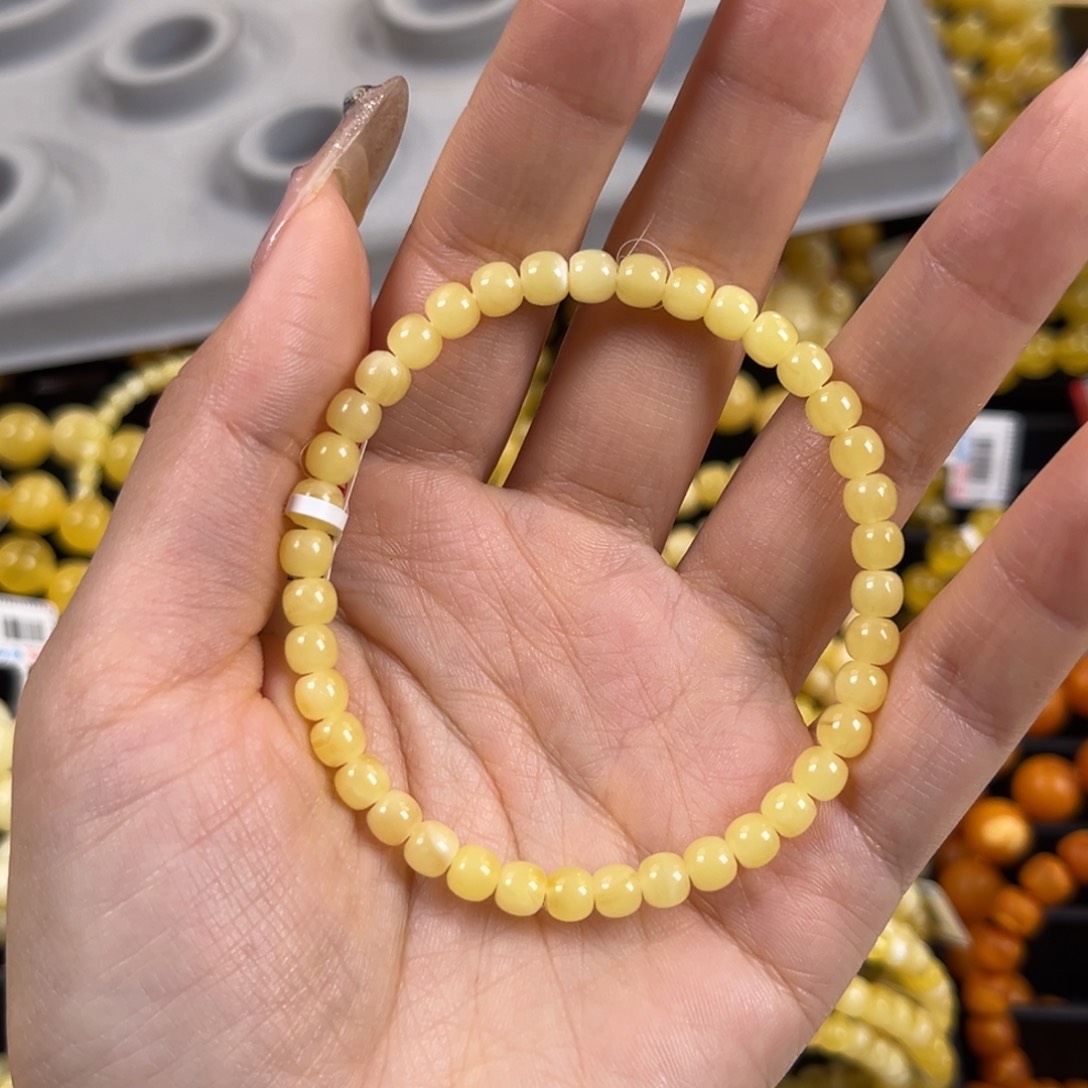 未镶嵌琥珀裸石人**醒奶酪