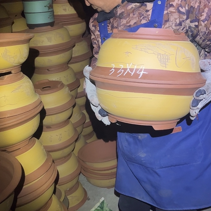 紫砂花盆紫砂花盆是指利用