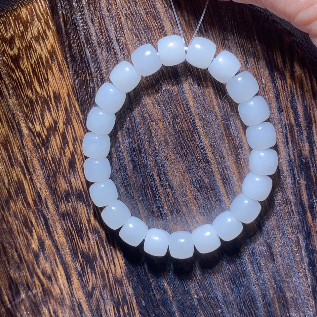 和田玉手串未镶嵌日**辉卡10直切