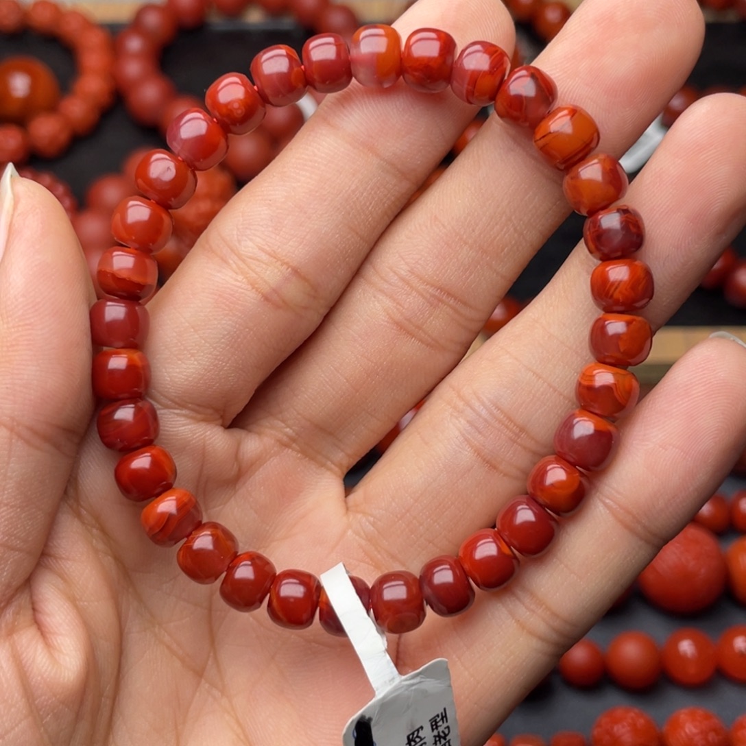 孙***大南红玛瑙未镶嵌手串H7mm满肉牛血火焰老型手串