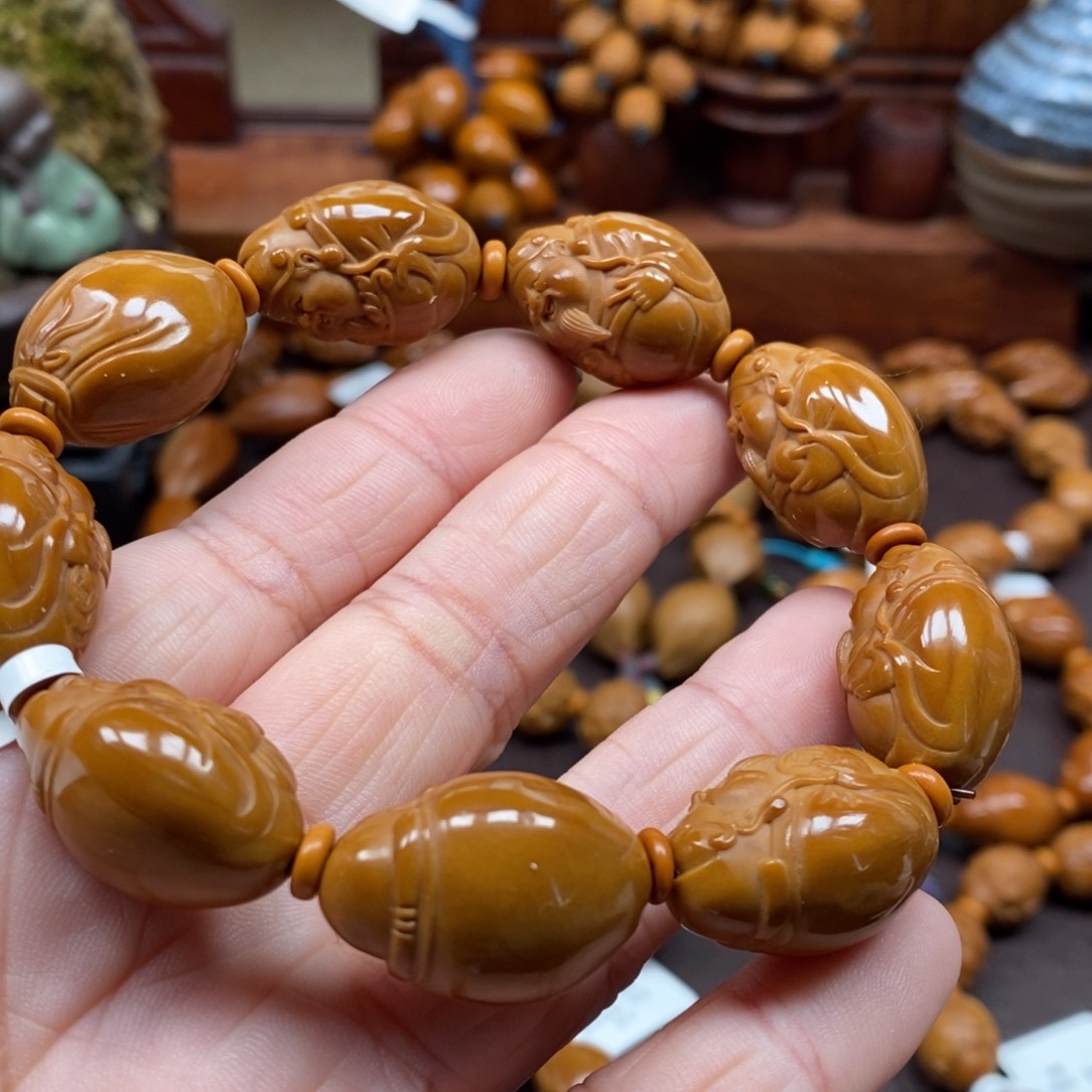 1.7八宝财神橄榄核手串