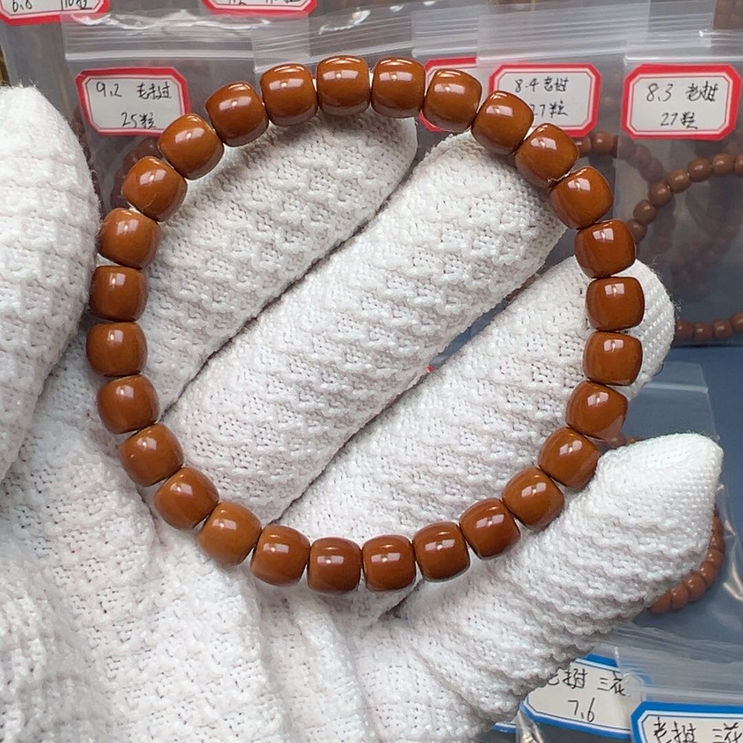 橄榄核吊坠老挝核尖单圈手串三花➕面无白7.9mm