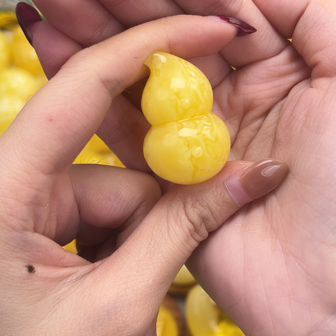 裸石琥珀未镶嵌喜**?焦皮葫芦妖花9g